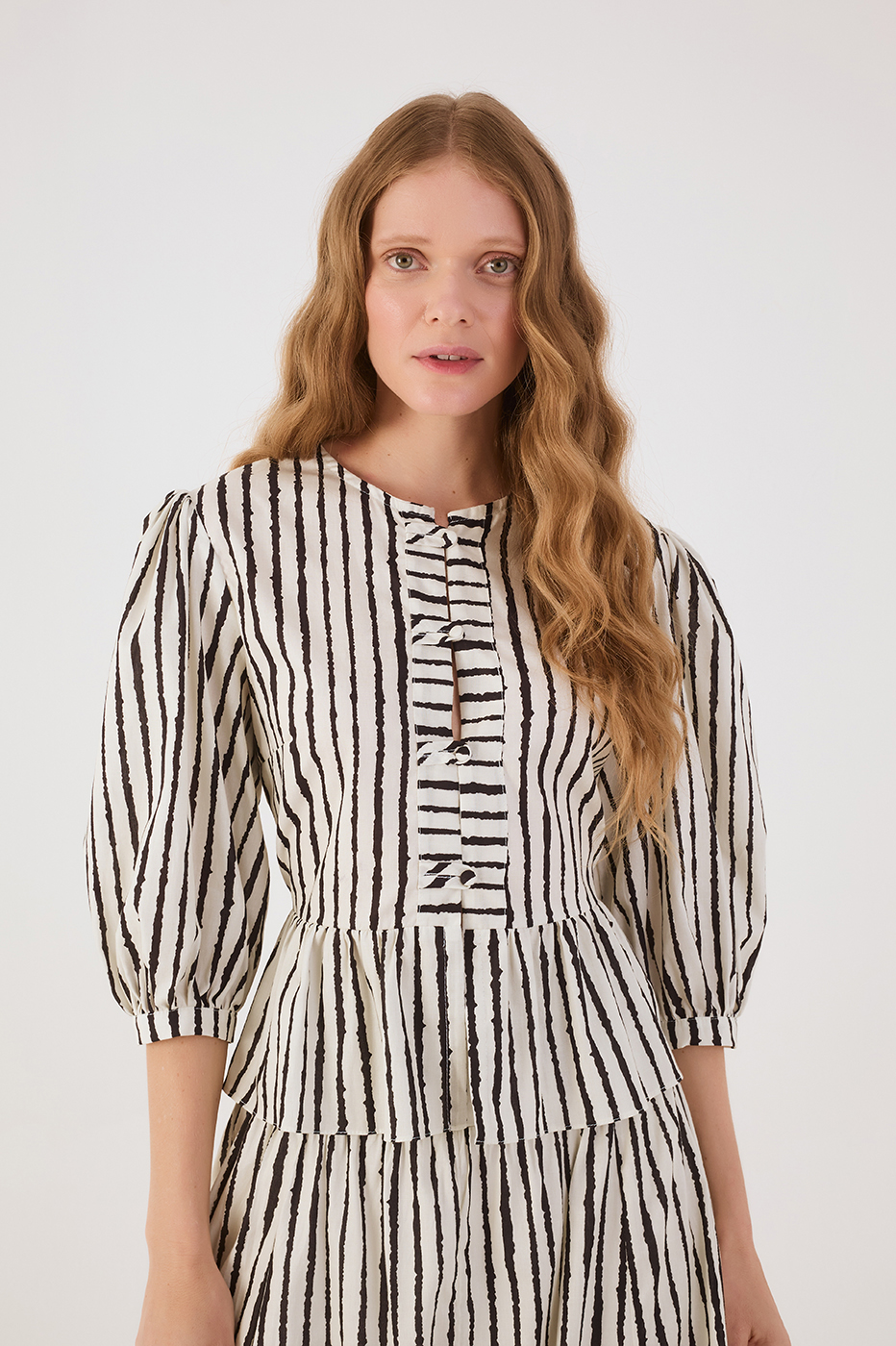 Bicolor Icarai Peplum Blouse
